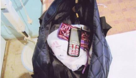 Məhbus oğluna telefon aparan ana tutuldu