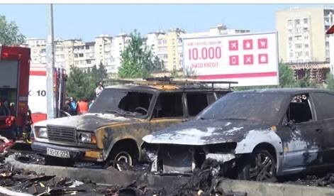 Bakıdakı yanan binanın qarşısında AKSİYA
