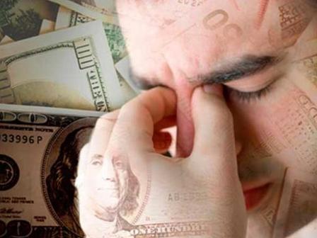 Dollar kreditlərinə görə Milli Məclislə hökumət arasında fikir ayrılığı yaranıb