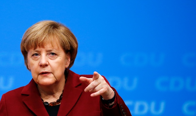 Merkel Trampın qərarını tənqid edib