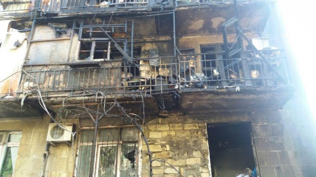 Yasamalda evləri yanmış 16 köçkün ailəsi təmirli mənzillərə qaytarıldı