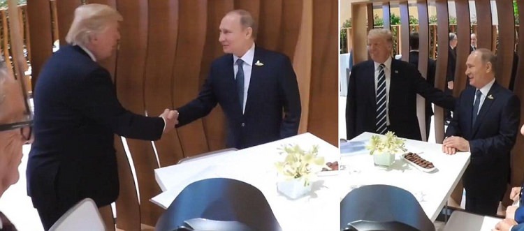 Putin və Tramp bir-brinin əlini sıxdı 