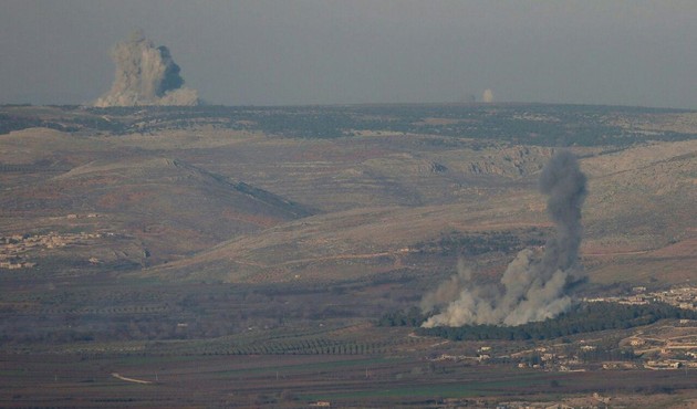 Afrində terrorçuların sığındığı ərazilər bombalandı