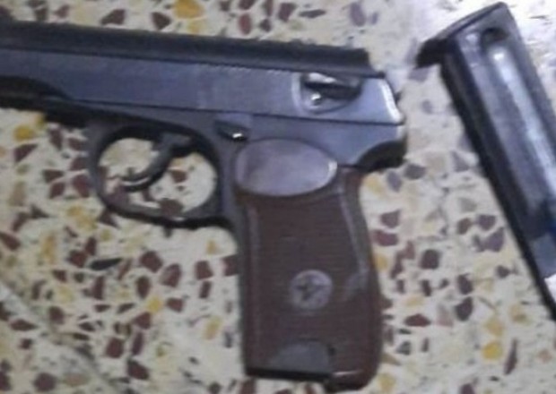 Məhkumun həyətində tapança və narkotik aşkarlandı