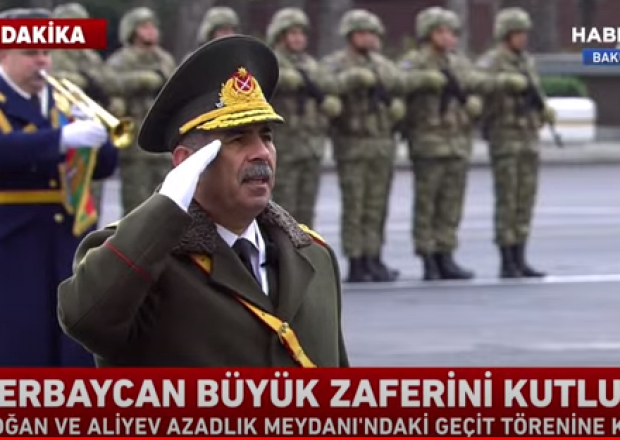 Zakir Həsənov Zəfər paradında raport verdi