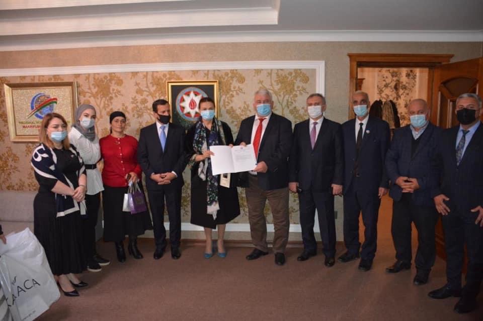 Deputat Axıska türkü qazi və şəhid ailələri ilə görüşdü