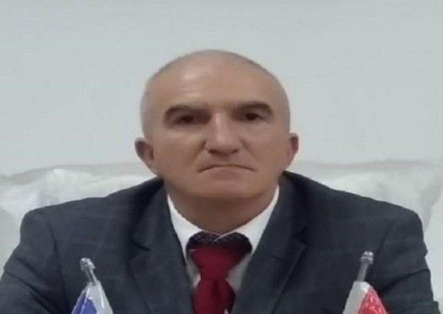 Azərbaycanda partiya sədri məhkəmədə qandallandı