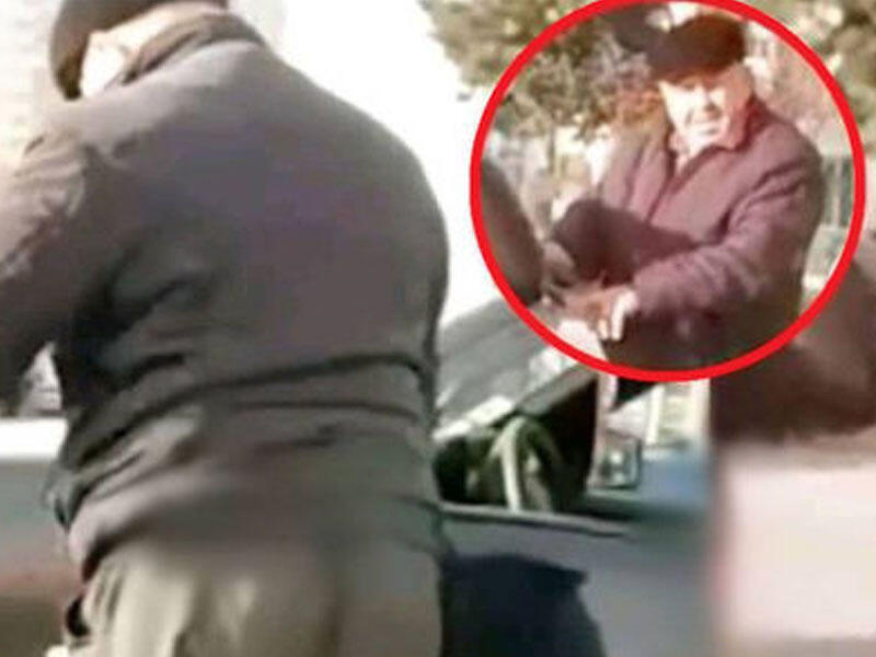 Maşınını bayraqla silən sürücü üzr istədi - VİDEO