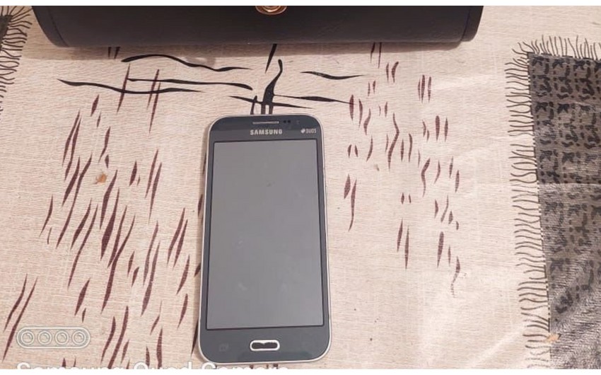 Qadın həbsdə olan ərinə telefon ötürmək istədi