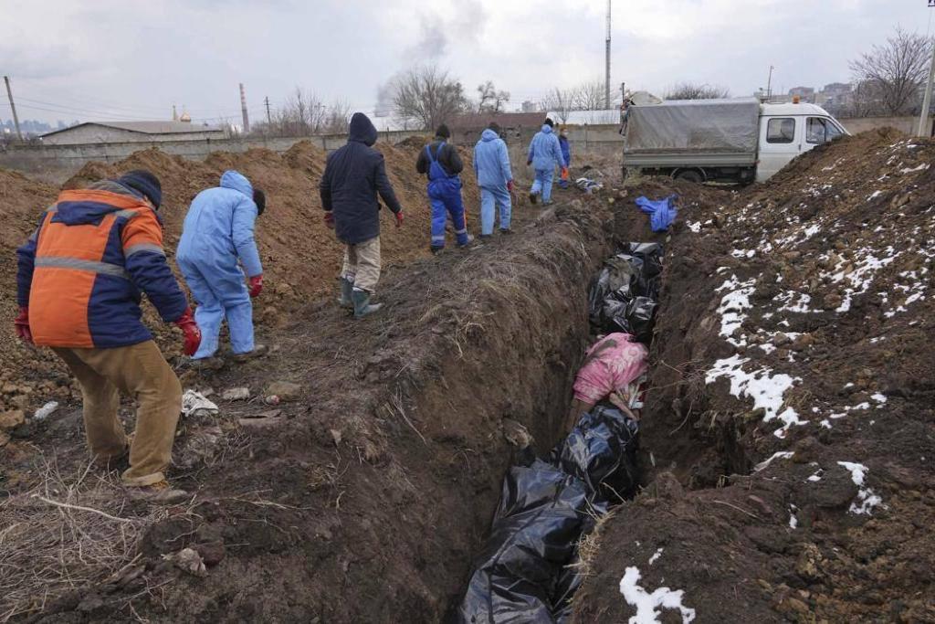 200 nəfəri bir məzarda basdırdılar