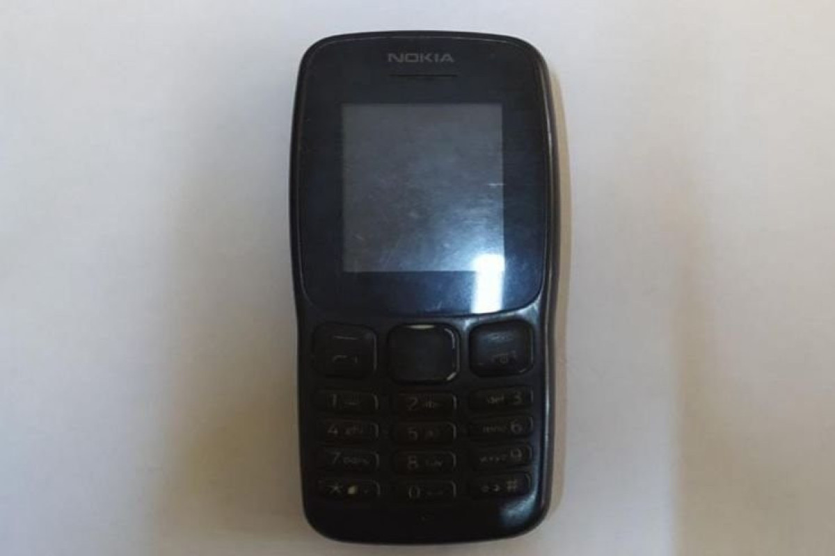 Həbsdə olan ərinə telefon aparan qadın saxlanıldı