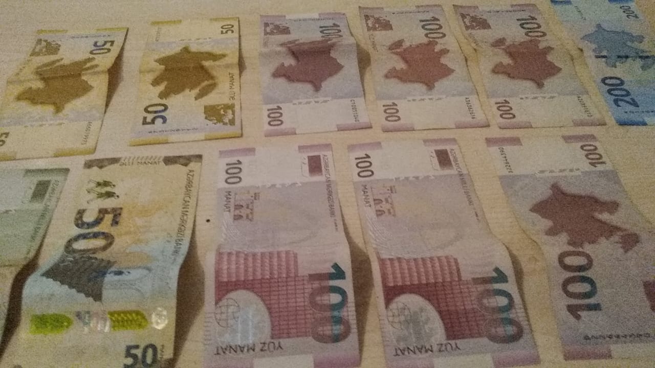 Evdən 21 min manat oğurladı - FOTO