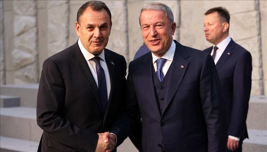 Akar yunan nazirlə bir araya gəldi