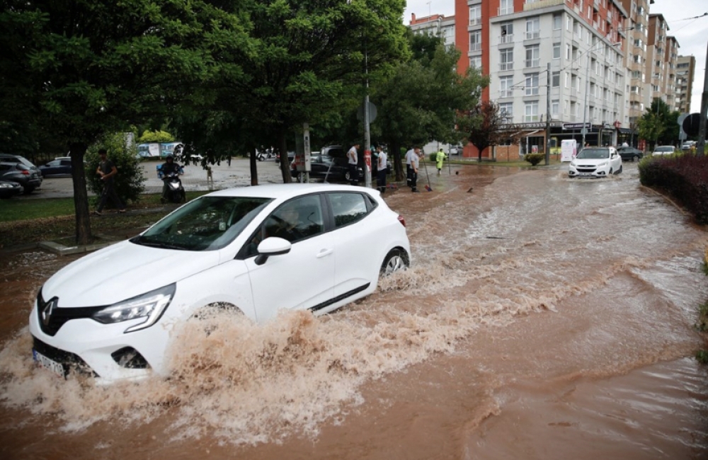 Ailə faciəsi: Ana və oğlunu sel apardı