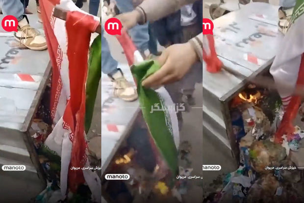 Etirazçılar İran bayrağını zibil qutusuna atıb yandırdılar - VİDEO