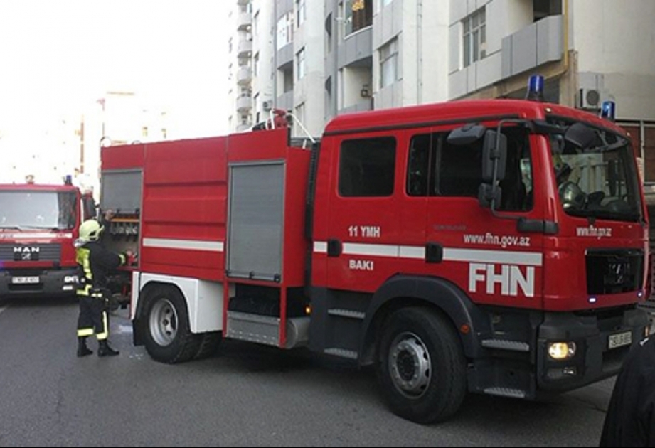 Çoxmərtəbəli yaşayış binasında YANĞIN