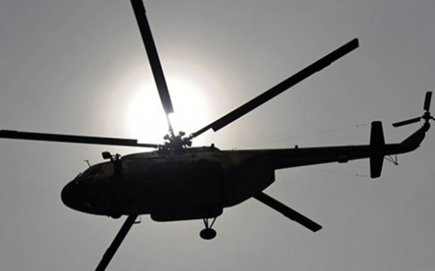 Hərbi helikopter çaya düşdü - Ölən və yaralananlar var