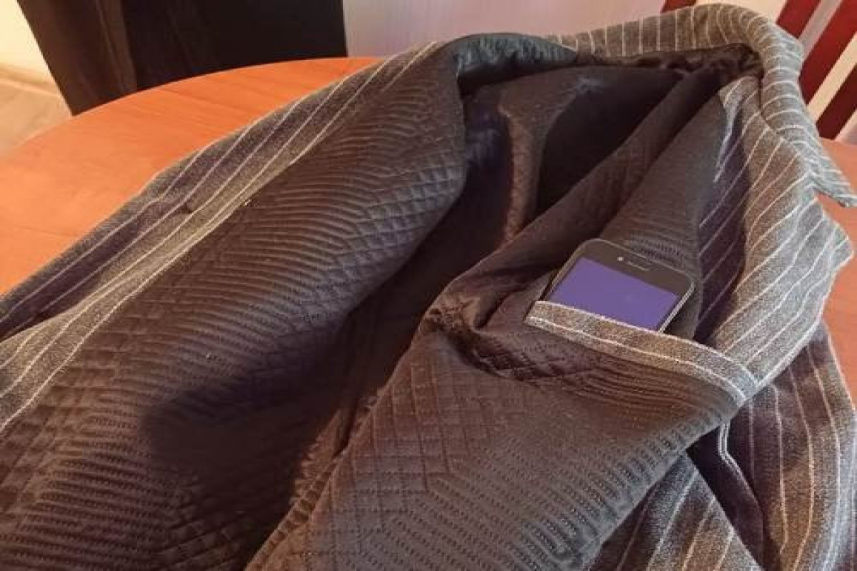 Ana həbsdə olan oğluna telefon ötürmək istədi yaxalandı