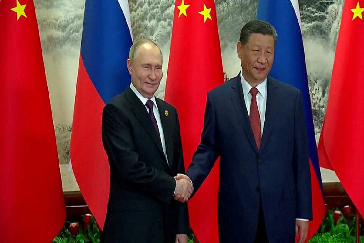 Putinin Çin sədri ilə görüşü başlayıb