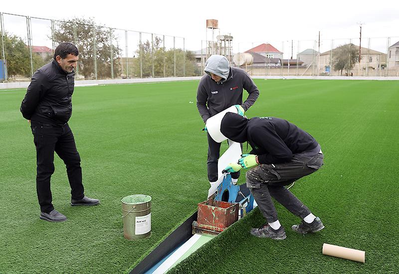 Binədə stadionun süni ot örtüyü dəyişdirildi - FOTO