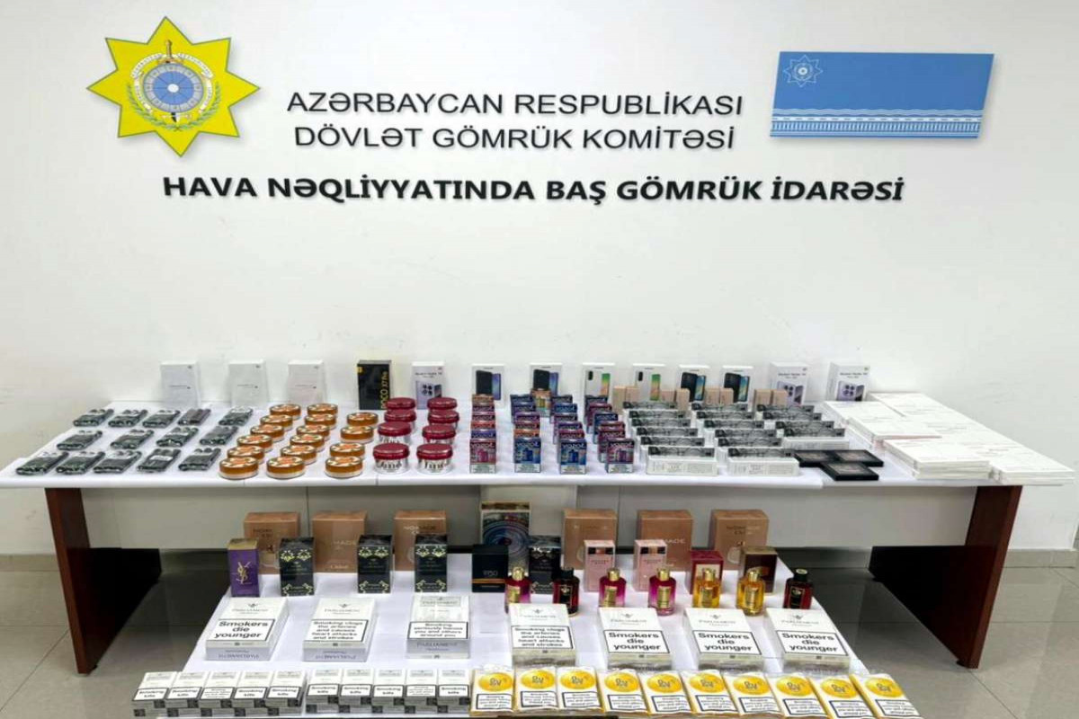 Mallarını gömrükdən keçirmək məqsədilə sərnişinlərə payladı - YAXALANDI